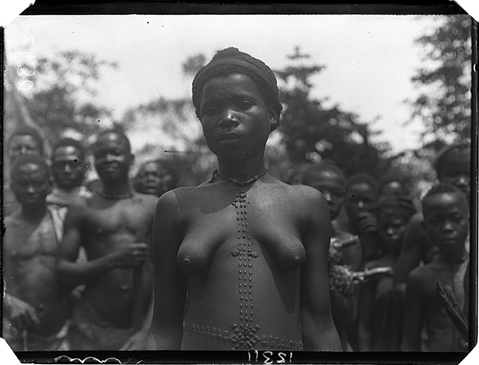 Woman with mbubu body marks, photographed by N. W. Thomas in Nri, 1911.