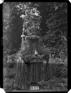 Eliminya Festival masquerade photographed by Northcote Thomas in Otuo in 1909