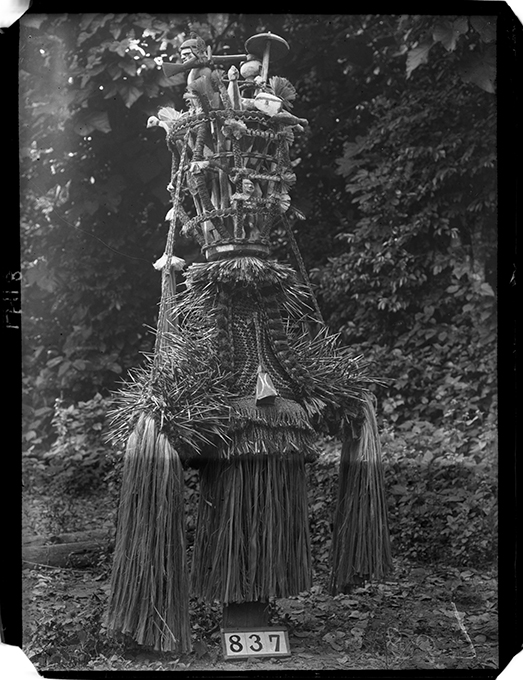 Eliminya Festival masquerade photographed by Northcote Thomas in Otuo in 1909