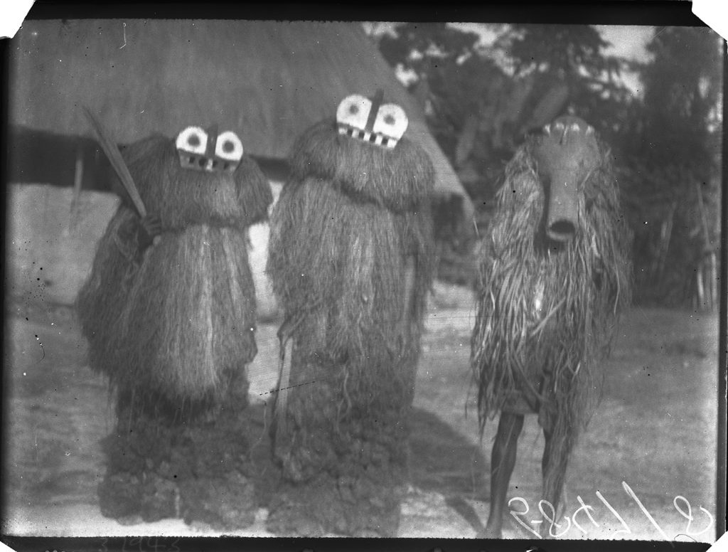 'Arong Athoma' and 'Namenkara' masquerades photographed by Northcote Thomas in Mamaka, Sierra Leone in 1914